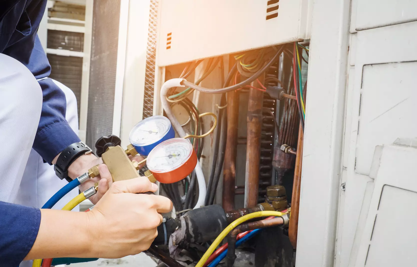 Legacy AC Technician Repairing an AC unit